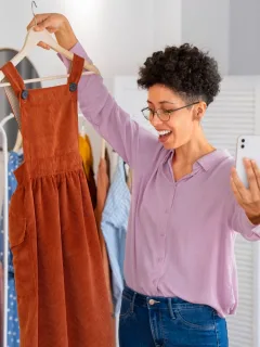 Woman getting clothes from Shein.