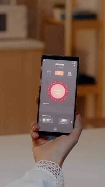 A close-up of a hand holding a smartphone, actively controlling a smart thermostat app interface. The app displays current temperature, scheduling options, and energy usage graphs, implying remote management and data insights.