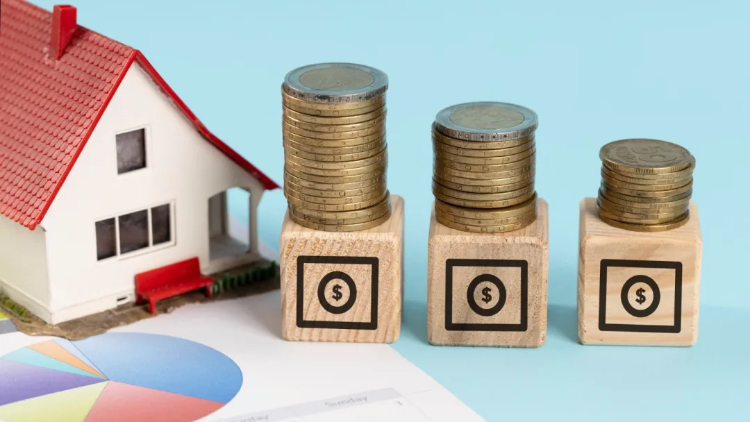 illustrative image with miniature house and coins for home equity line of credit.