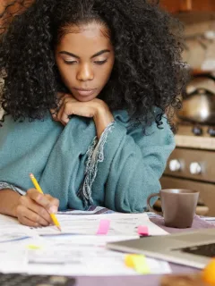 Woman learning how to Improve Financial Health.