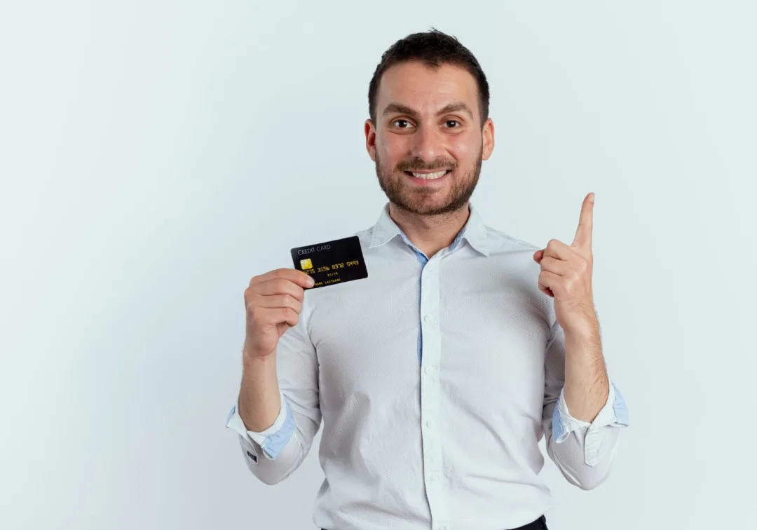 a man holding his Preferred Credit Card.