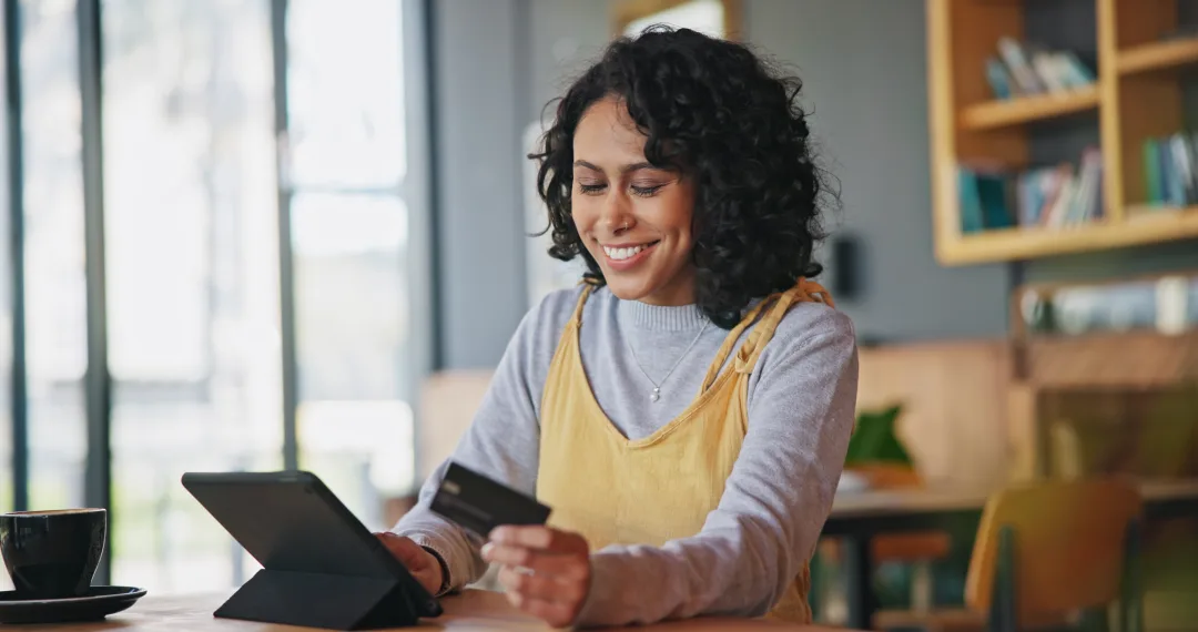 Woman learning how BNPL Impacting FICO Scores.