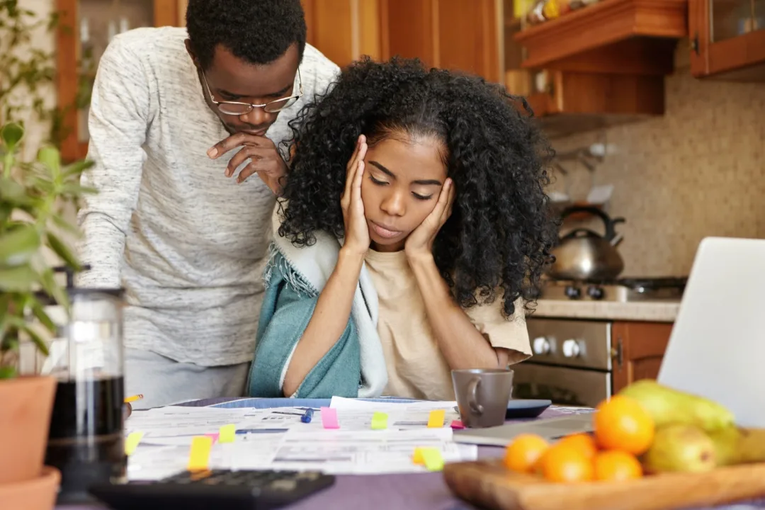 A couple checking the Credit Score.