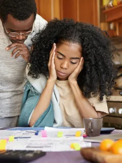 A couple checking the Credit Score.