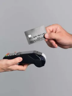 Someone using the QuicksilverOne Capital One.