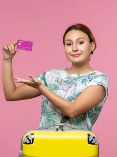 woman using travel credit cards.