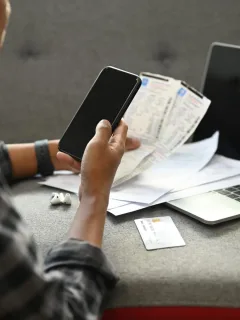 person paying bills online safely