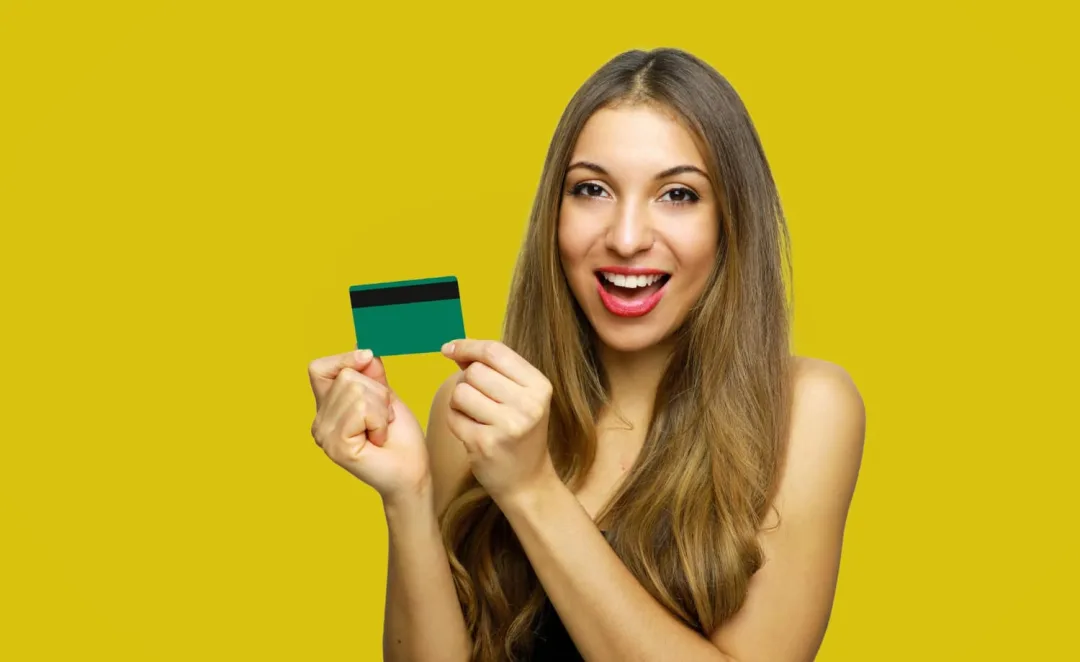 Woman using her Chime Credit Builder Secured Card.