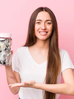 A happy woman learning how to save money.