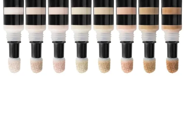 A diverse array of contouring and highlighting products arranged neatly, featuring cream sticks, liquid drops, and powder palettes, illustrating the variety of textures and applications.