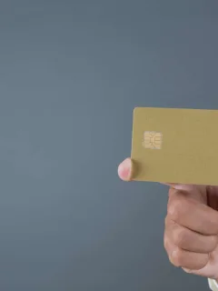 Someone holding a Delta SkyMiles Gold.