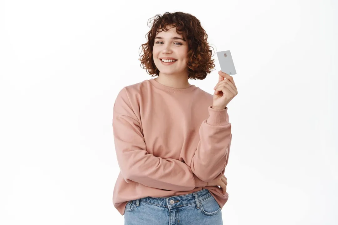 Woman holding her CareCredit.