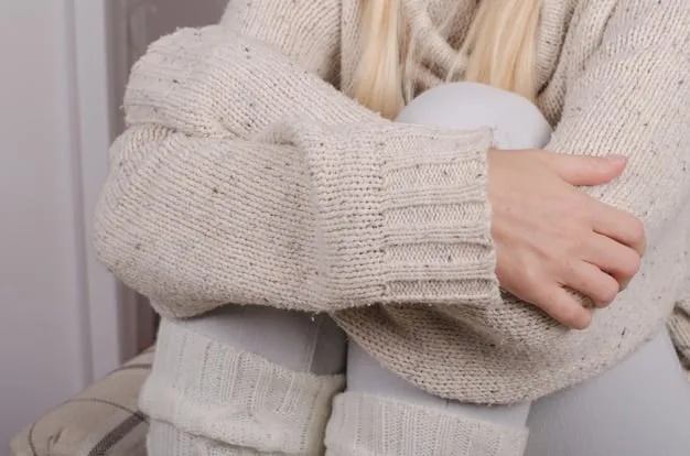 A close-up shot of hands touching various high-quality athleisure fabrics, showcasing the texture and luxurious feel of modern blends like modal, Tencel, and cashmere, on a neutral background.