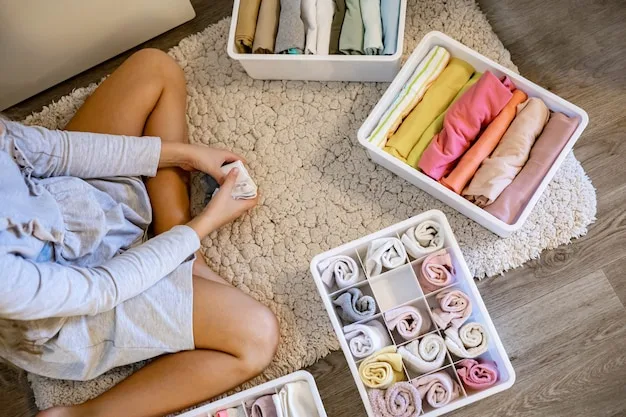 A person thoughtfully organizing their capsule wardrobe, with neatly folded clothes and accessories arranged in a minimalist closet, emphasizing organization and conscious choices, perhaps with a journal nearby for planning outfits.