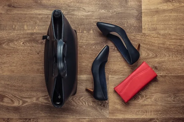 A detailed flat lay of a chic black leather handbag, a pair of classic black pumps, and a minimalist wallet, illustrating organized elegance and the interplay of essential accessories.