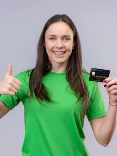 Woman holding her TD Cash Credit Card