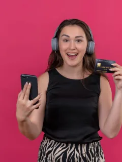 Woman holding her Bilt Mastercard.