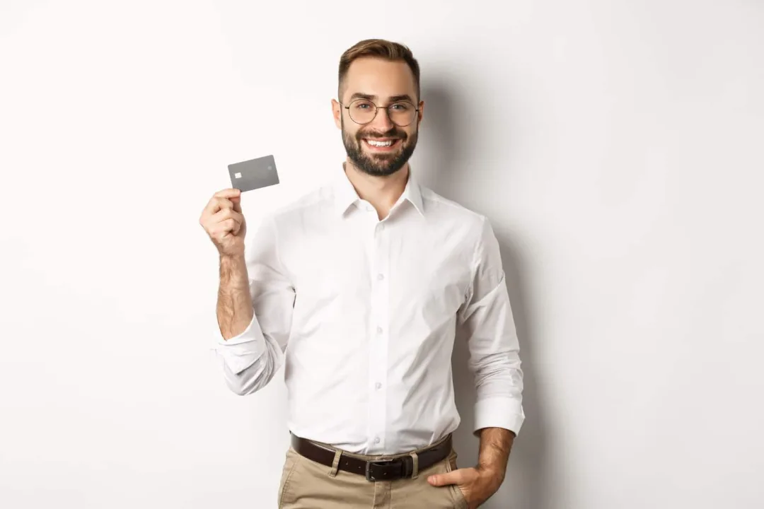 A man holding his Southwest Rapid Rewards Card.