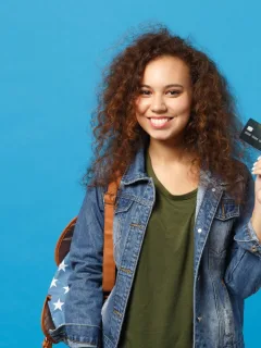 A girl using her Student Credit Card.