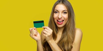 Woman using her Chime Credit Builder Secured Card.