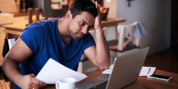 A man learning how to manage a personal loan.