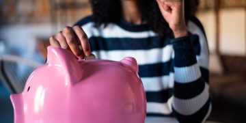 A kid learning about Financial Literacy for Young People.