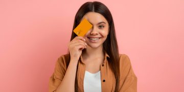 A girl holding her Wells Fargo Health Advantage.