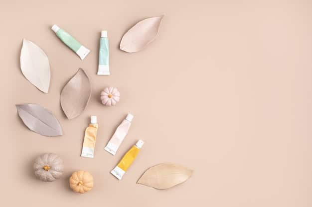 A detailed flat lay of various skincare products specifically formulated for dry skin: a creamy cleanser, a hyaluronic acid serum, a thick moisturizing cream, and a facial oil, all arranged aesthetically on a smooth, white surface.