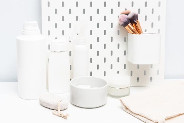 A variety of skincare products on a clean, white vanity, including cleansers, toners, and serums, hinting at a comprehensive daily routine.