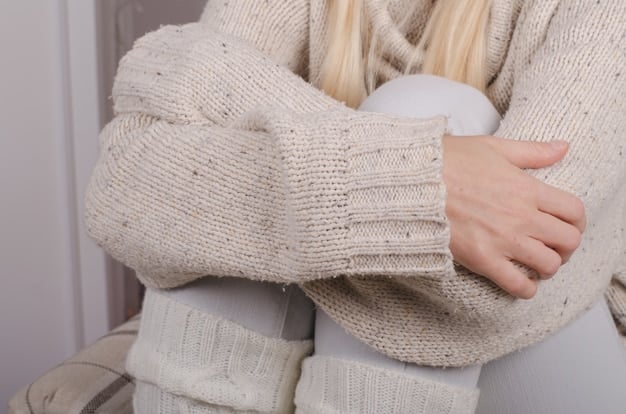 A close-up shot of hands touching various high-quality athleisure fabrics, showcasing the texture and luxurious feel of modern blends like modal, Tencel, and cashmere, on a neutral background.