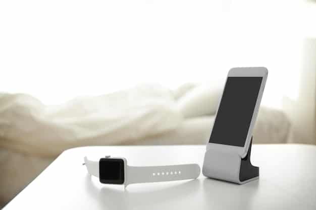 A sleek, minimalistic charging dock for multiple devices, including a smartphone, smartwatch, and wireless earbuds, all neatly arranged and charging.