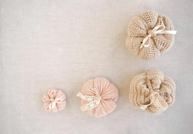 A detailed flat lay of various sustainable fabric swatches in muted tones and natural textures, alongside wooden buttons and dried flowers, emphasizing eco-friendly textile choices.