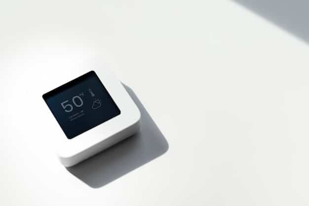 A close-up shot of a modern smart thermostat displaying energy usage data and a comfortable indoor temperature, with a sleek smart home hub device subtly blurred in the background, suggesting their interconnectedness.