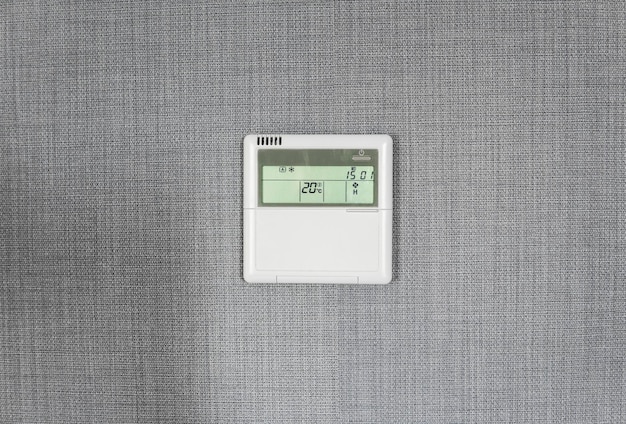 A close-up of a smart thermostat screen showing different temperature settings for multiple rooms or zones, illustrating the zoning feature.